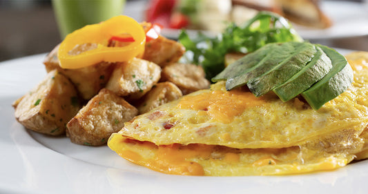 Omelette with avocado slices on top