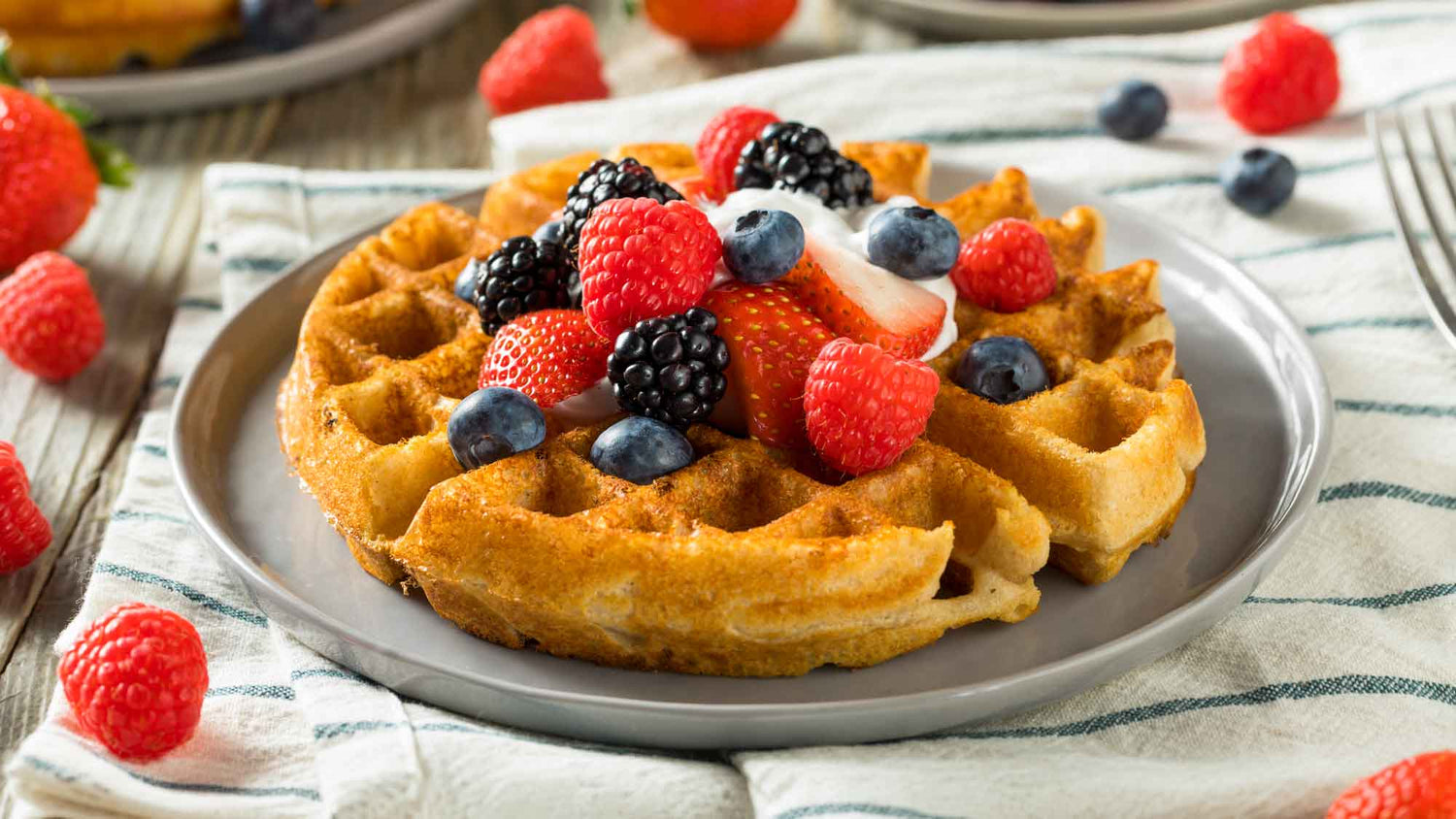 Protein Packed Collagen Waffles protein packed collagen belgian waffles topped with berries and skyr