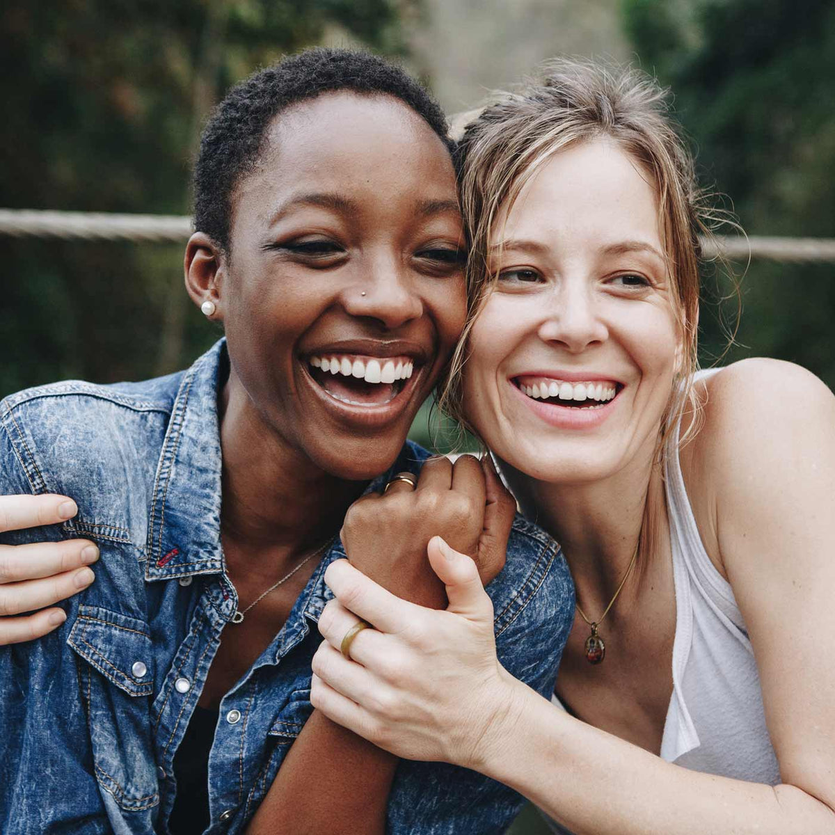 Skin Health and Elasticity Two women side hugging
