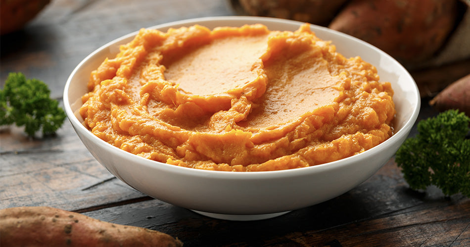 Bowl of mashed sweet potato